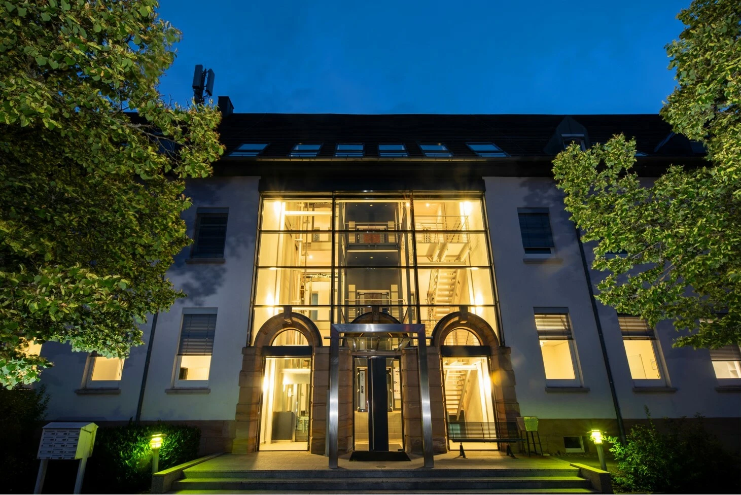 Front of the main building at dusk