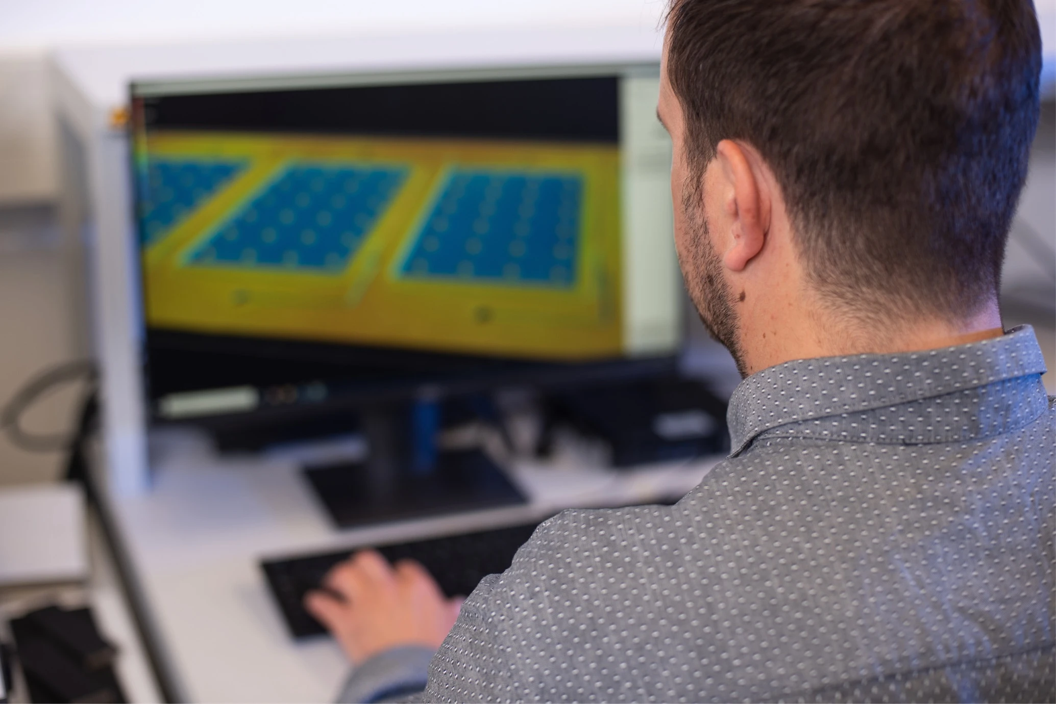 A person in front of a computer